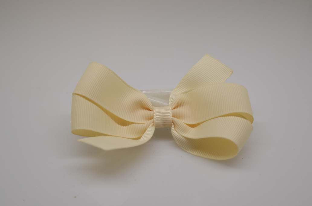 Large pinwheel hair Bow with colors  Ivory